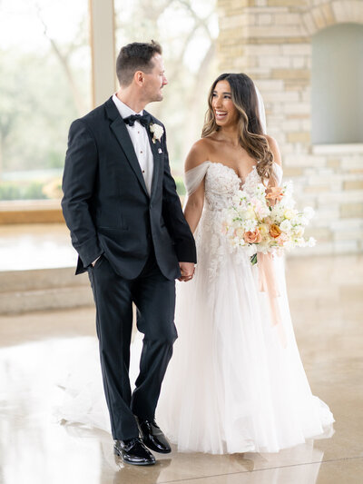bride and groom wedding portraits on the ridge at Canyonwood Ridge