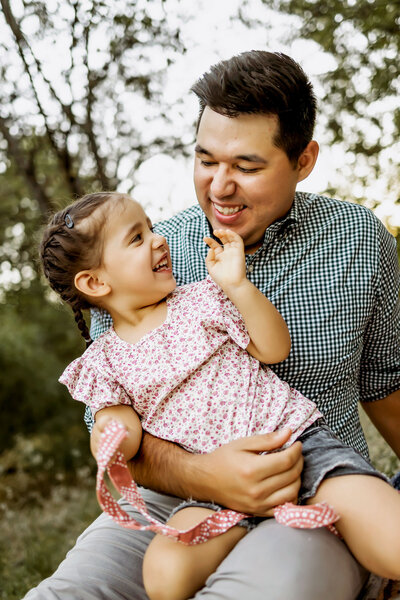 dad and daughter share a smile in carrollton texas