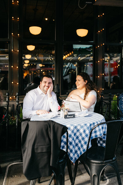 couple sits at Perry's on Union St. in San Francisco, a local historic restaurant where they had their first date