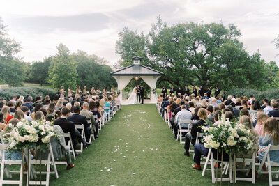 An outdoor wedding ceremony at Kendall point's gazebo