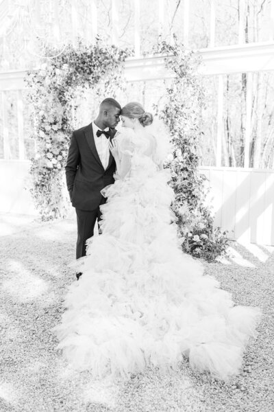 Bride and groom walk up memorial steps at their DC wedding