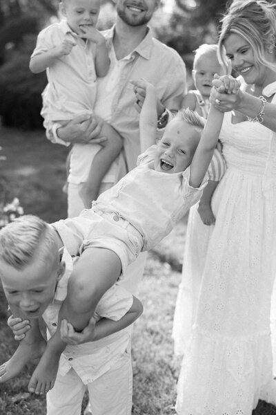 Family playing taken by chicago film photographer Allison Francois