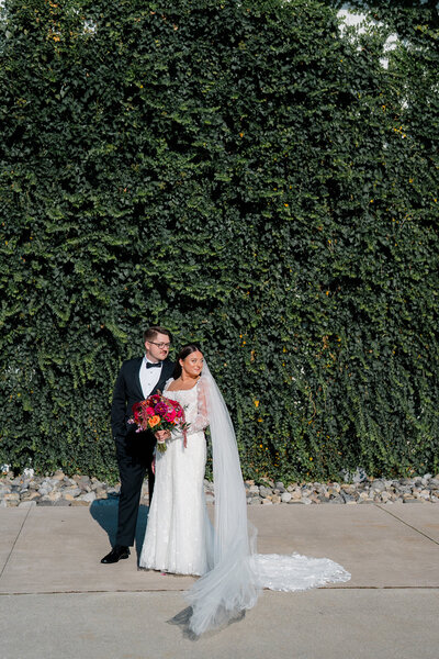 Bride and Groom stand for an editorial portrait at Cape May, New Jersey wedding.