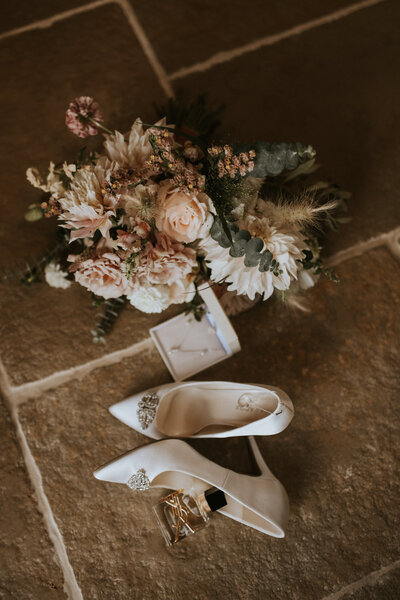 Details of wedding flowers and shoes