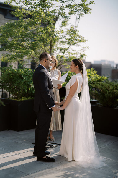 Candid wedding ceremony at Loft Lucia in Chicago, captured by Chicago wedding photographer Abe Fernandez in a documentary and film style