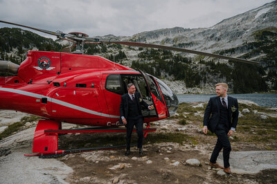 Helicopter mountain elopement for two grooms