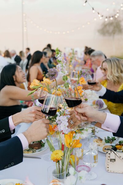 aperol spritz and custom bar napkins styled on bar at wedding