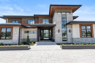 Exterior shot of the Stillwater Modern Prairie project by Idaho luxury custom home builder Thompson Homes