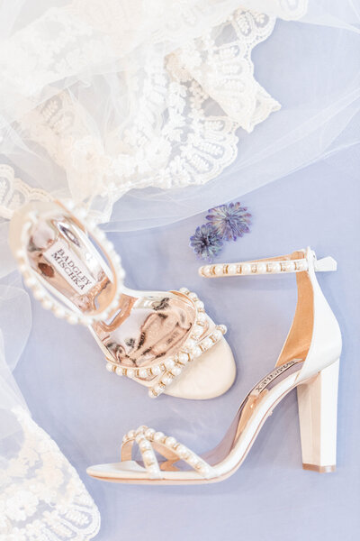 bridal shoe flat lay photographed by Kaitlin Mendoza Photography, a wedding photographer in Indianapolis