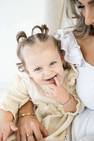 oklahoma city one year old girl celebrating her first birthday session at okc milestone photography studio