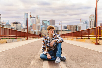 High school senior boy siting on the road - Minneapolis, Minnesota