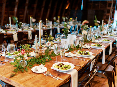Romantic wedding tablescape with elegant floral arrangements of soft pink roses and white hydrangeas by Leigh Floris