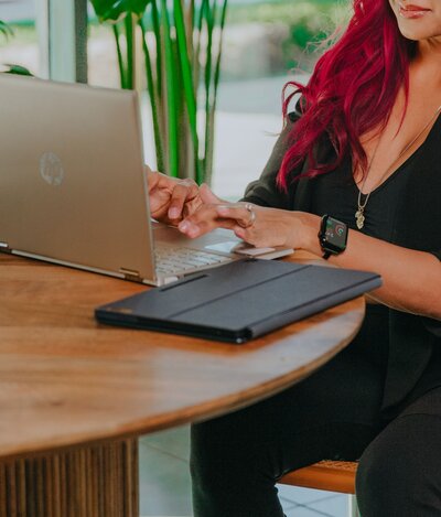 Entrepreneur typing diligently on a keyboard