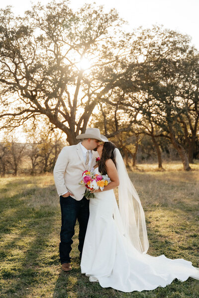 bride and groom kissing