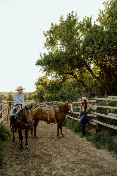 couple with their horses