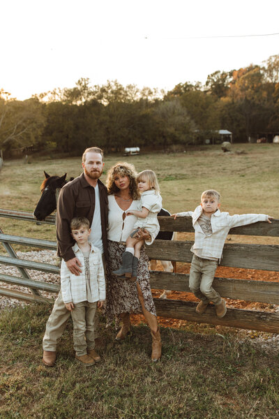 Family with 3 young chlidren, two boys one girl