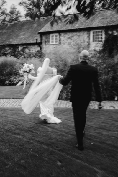 Bride and groom first look photos in field
