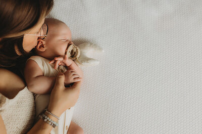 mother cuddling newborn – The Woodlands, Texas