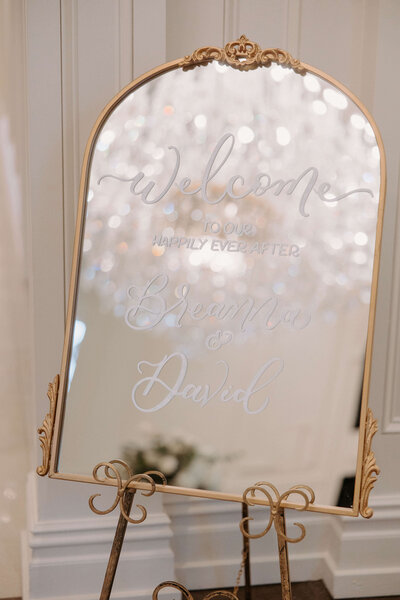 Antique wedding mirror with hand-lettered calligraphy