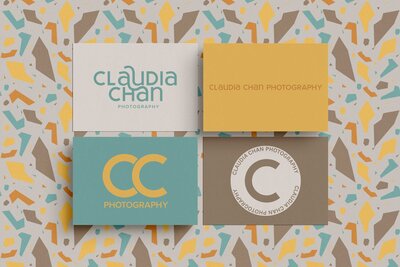 Four business cards laid out together for Claudia Chan Photography