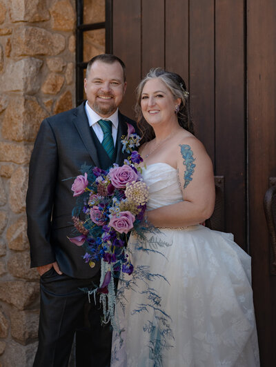 bride standing next to gas