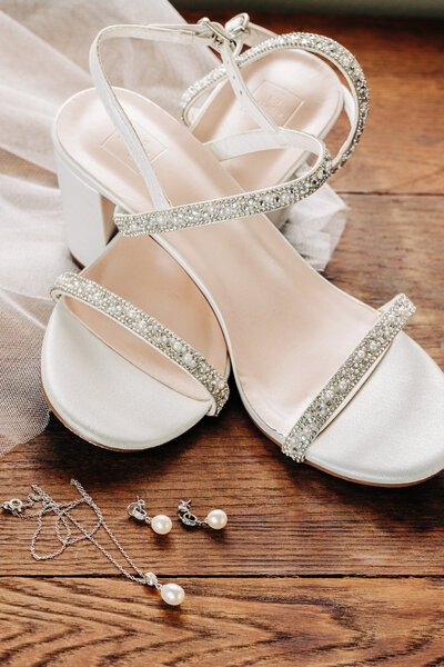 Wedding detail photo bride shoes and jewelry