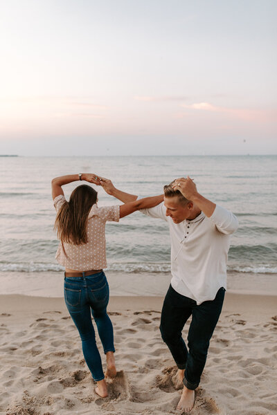 couple running on beach