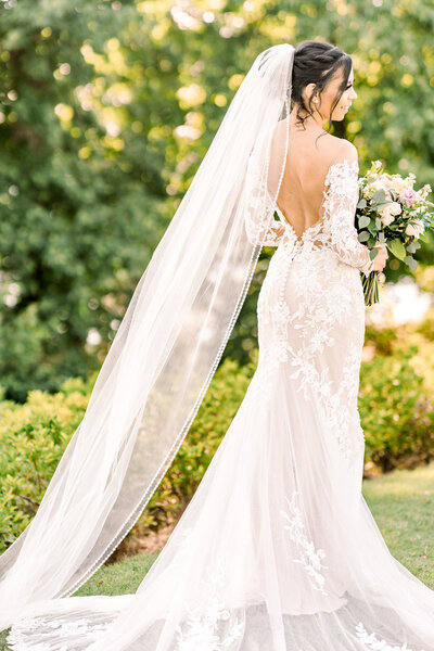 Foxhall wedding - black wedding - bride in dress with long veil