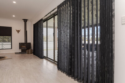 Modern curtains and roller blinds installation for tailored light control and privacy solutions.
