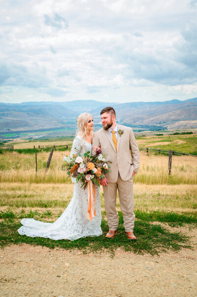 Jackson Hole photographers capture summer elopement bridal portraits of couple