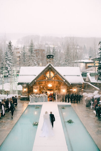 Walking down the aisle at Four Season Vail Wedding