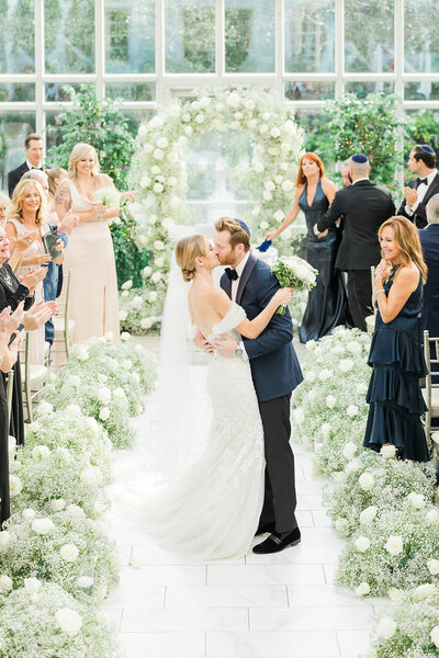 bride and groom kissing