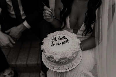 til death do us part wedding cake bride and groom