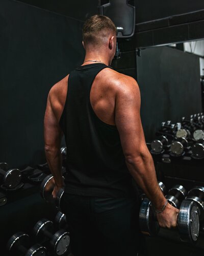 Man lifting dumbbells