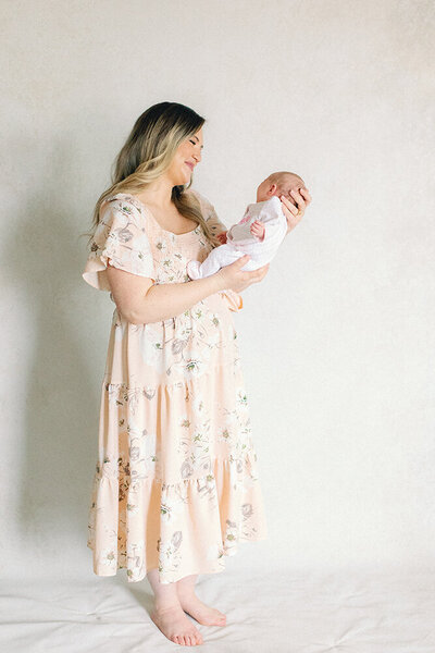 mom holding newborn baby