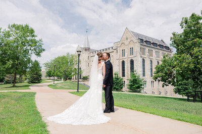 groom and bride kissing taken by minneapolis wedding photographer