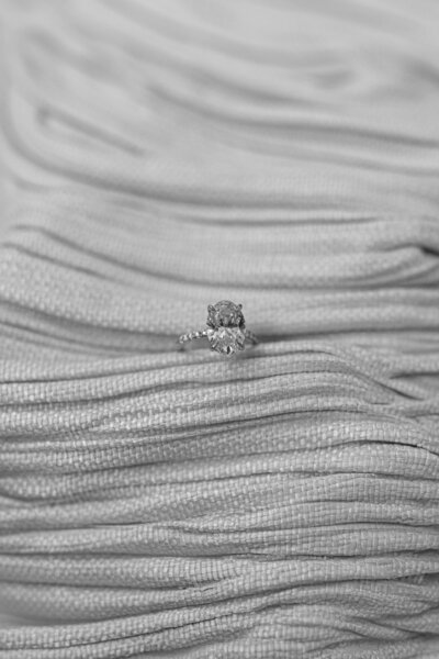 textured wedding detail photo of engagement ring