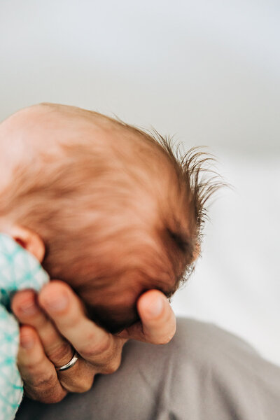 up close detail photography of a newborn's whispy hair