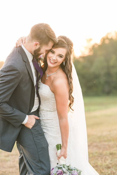 Bride and groom portraits at sunset in the fall