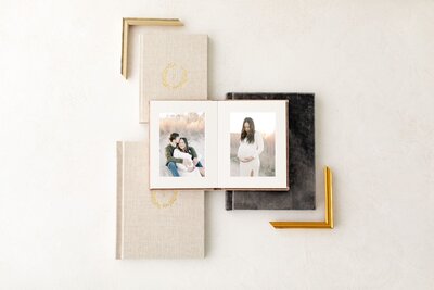 Albums open with frame options on table.