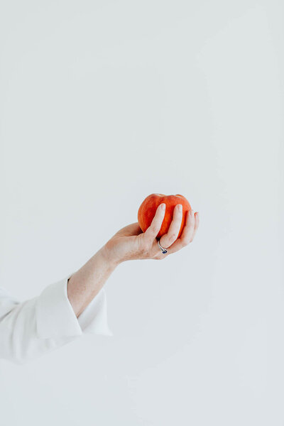 Elizabeth holding apple