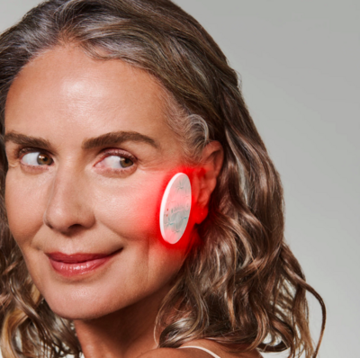 Omnilux Mini Skin Corrector uses red light therapy to target fine lines, age spots & fight inflammation