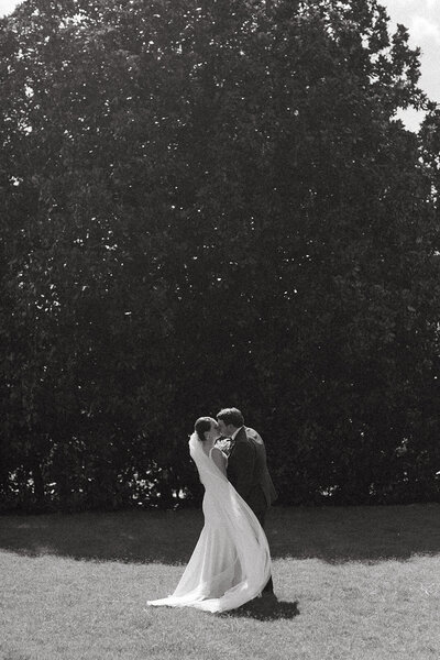 Bride and groom walk up memorial steps at their DC wedding