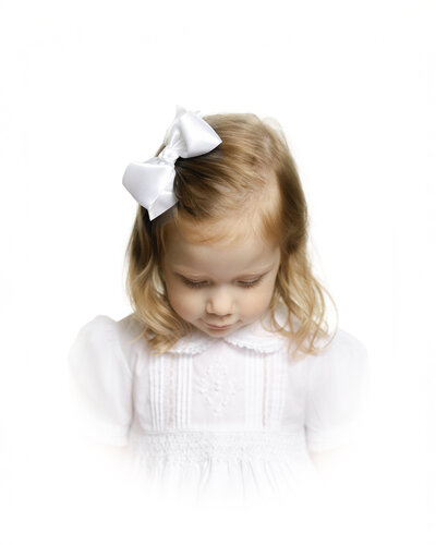 Heirloom Portrait of girl in Feltman Borther's dress by Caroline Eidson 