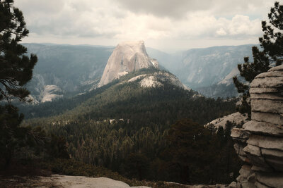 Sun shining on half-dome in Yosemite National Park