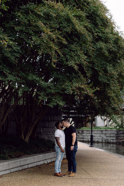 Silhouette of Micah and Dough at sunset during their engagement shoot in Richmond, Virginia.