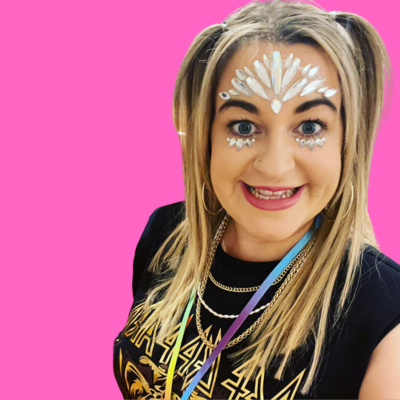 Girl with jewels on her face and bunches in