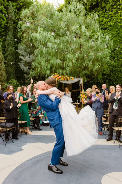 Los Angeles wedding couple kiss after wedding ceremony