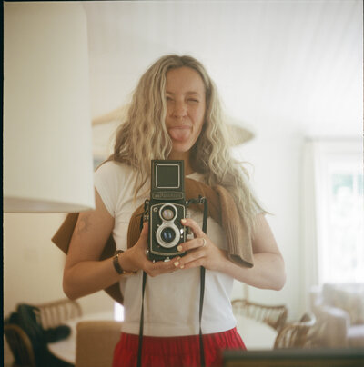 Self portrait of Lindsey Whatley shot on film by Lindsey Whatley Photo, East coast documentary-style wedding photographer for the untraditional