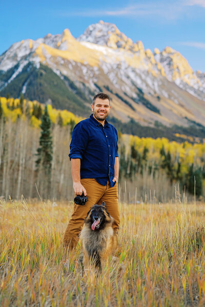 CO photographer posed with dog out on a run